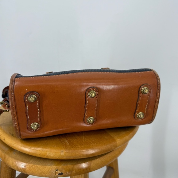 Dooney & Bourke vintage AWL black and British Tan small satchel
